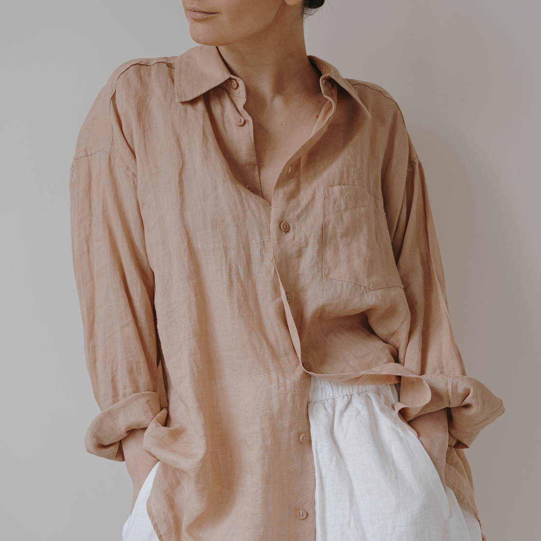 Woman in Neutral Linen Clothes