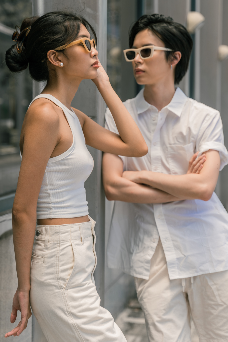 Man and Woman in White Casual Clothes