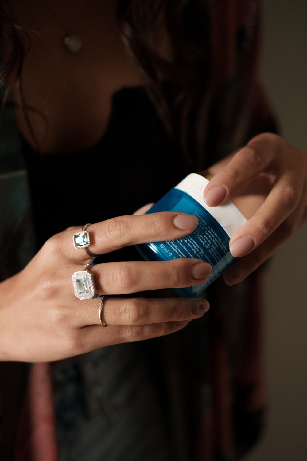 Beauty Product in Hands Close-up 